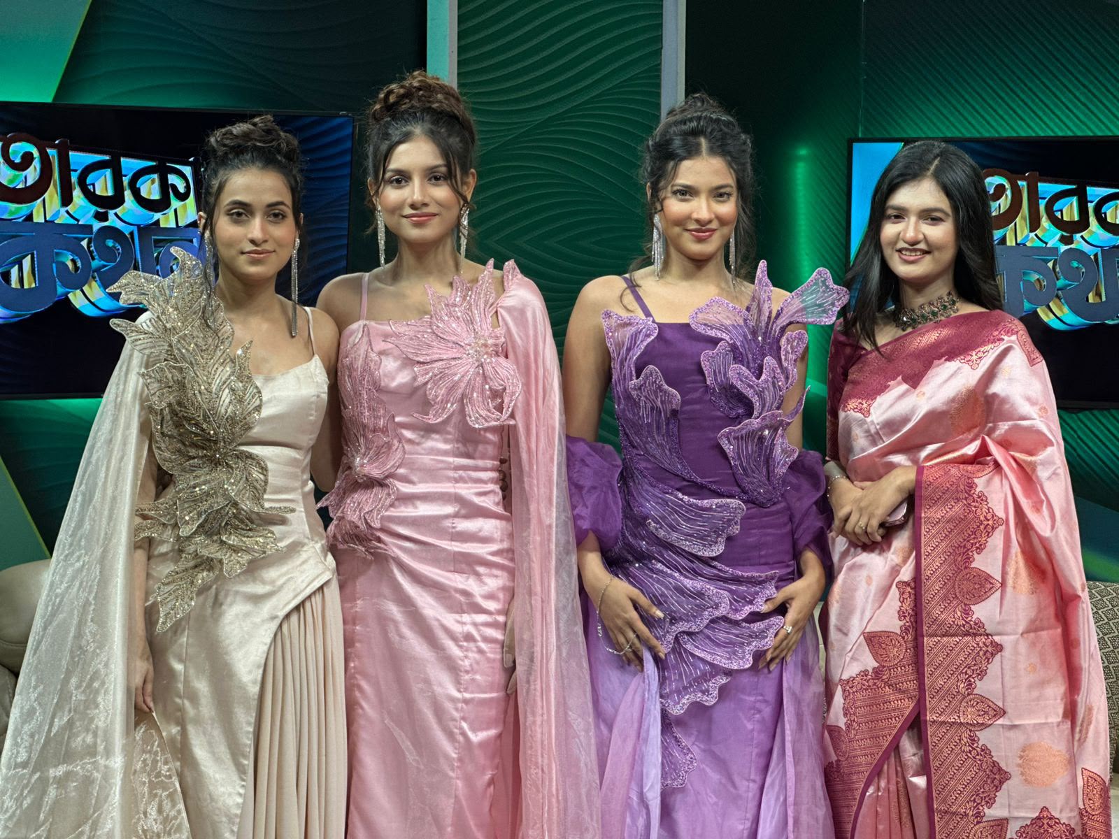 Sanjida Rahman with three guests in traditional attire on a studio programme